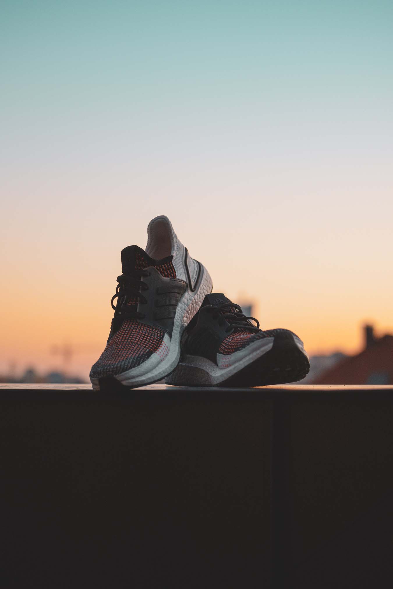 A pair of sports shoes at dusk