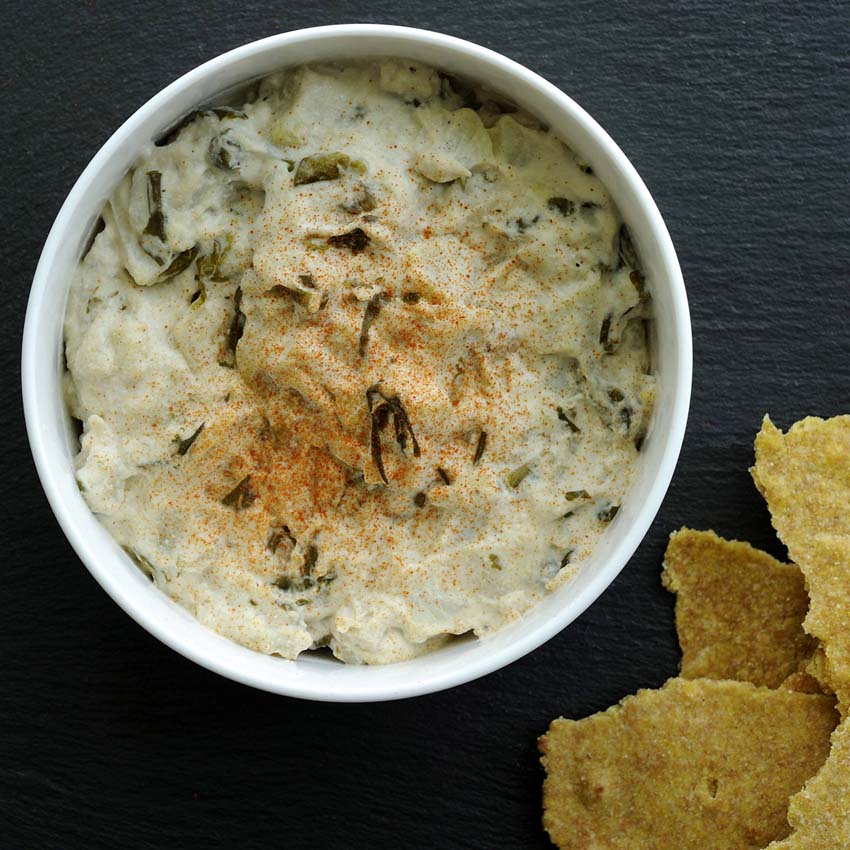 crackers beside artichoke-dip